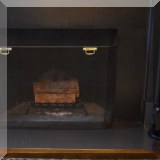 D01. Fireplace screen and tools. 